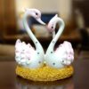 Hand-polished pink and white marble swan pair
