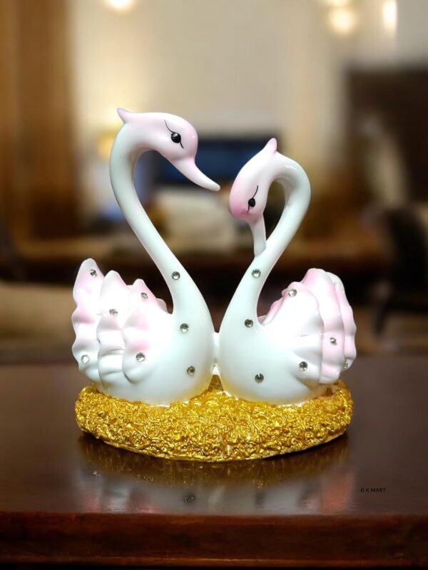 Hand-polished pink and white marble swan pair