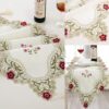Short satin table runner with delicate floral embroidery and lace
