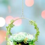 Metal flower pot with chain for hanging plants in balcony
