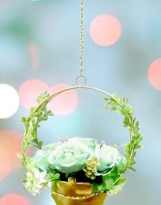 Metal flower pot with chain for hanging plants in balcony