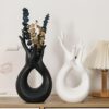 Artistic hand-shaped ceramic vase for centerpieces