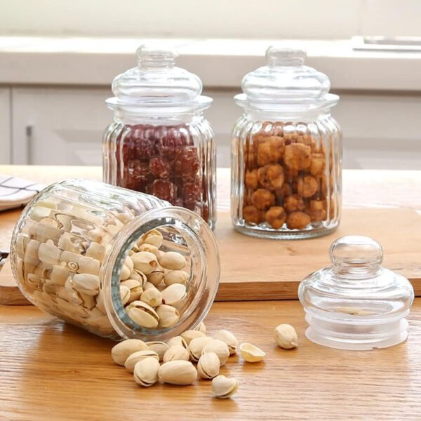 Set of transparent glass pop jars with airtight lids