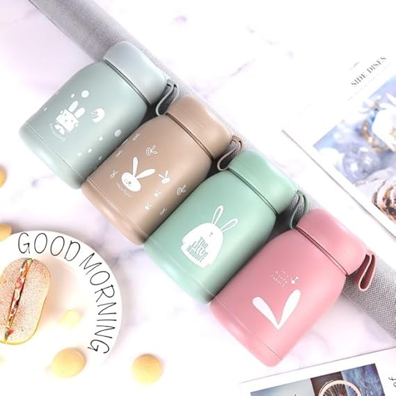 Adorable glass water bottle featuring hand-drawn rabbit pattern