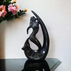 Black ceramic mermaid statue with angel fish for home décor