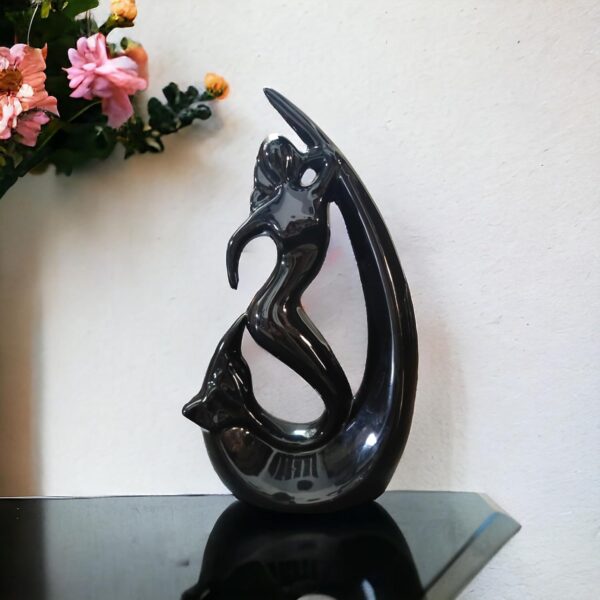 Black ceramic mermaid statue with angel fish for home décor
