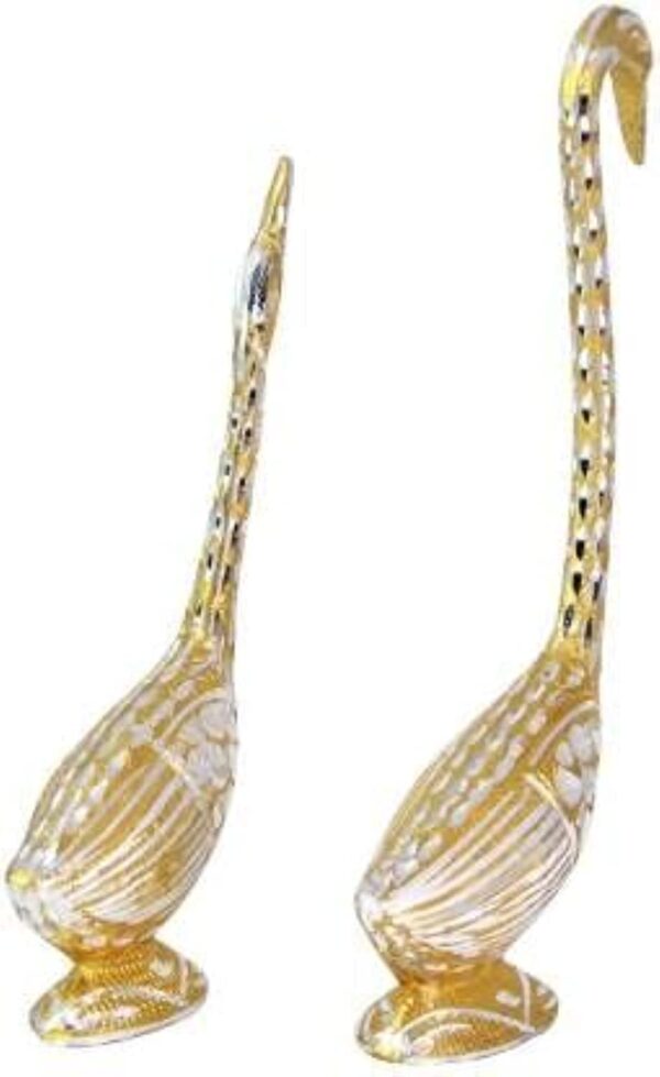 Handcrafted kissing bird couple metal sculpture adding romance to bedroom décor