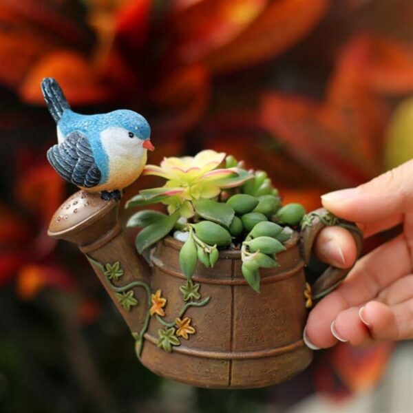 Unique handicraft watering can with bird flower pot design