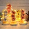 LED illuminated artificial sunflower under glass dome for tabletop décor