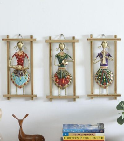 Handcrafted metal wall decor with colorful Rajasthani musician figures