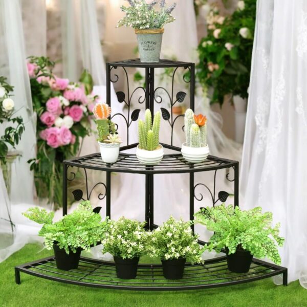 Metal plant stand with tiered shelves for indoor plants