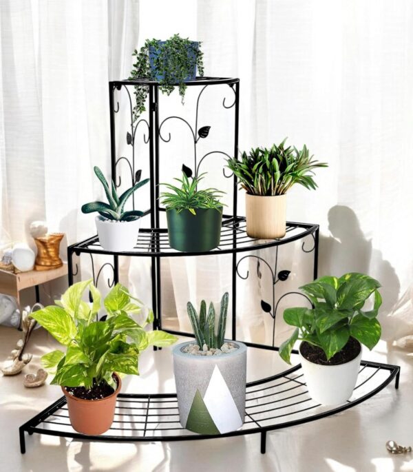 Stylish metal corner plant stand with decorative floral design