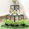 Multi-level metal plant stand with semicircle floral frame