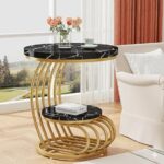 Modern luxury round table with gold metal base and black marble top