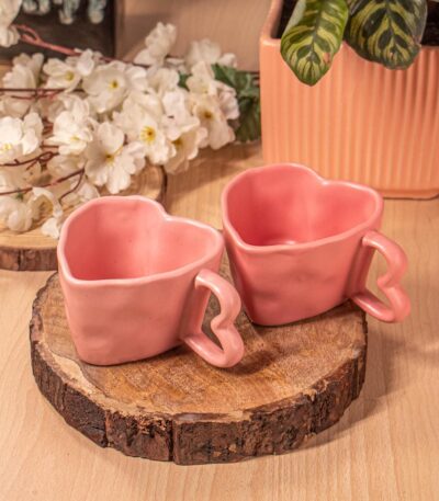 Elegant Pink Ceramic Mug Set with Artistic Design