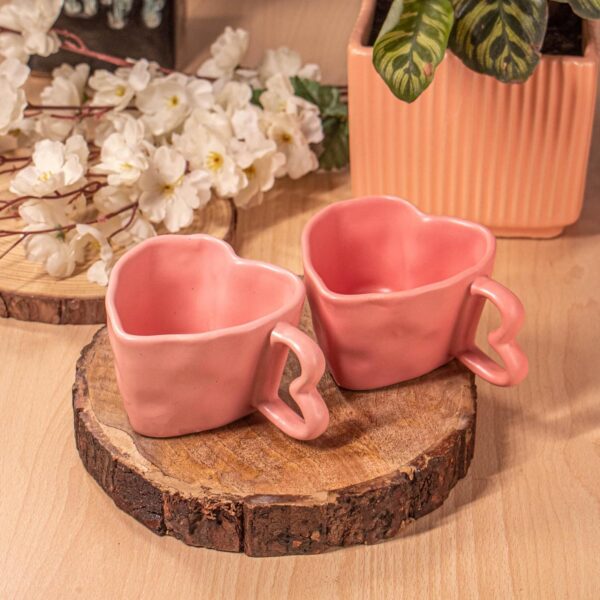 Elegant Pink Ceramic Mug Set with Artistic Design