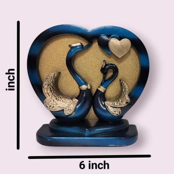 Artistic swan couple showpiece with heart frame