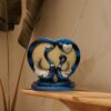 Stylish ceramic swan figurine couple with heart frame centerpiece