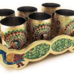 Traditional Indian peacock motif on stainless steel glass