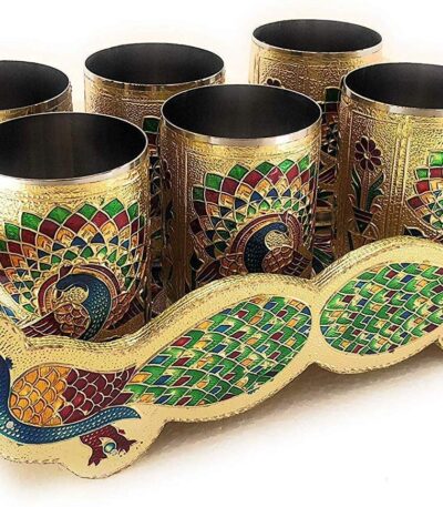 Traditional Indian peacock motif on stainless steel glass