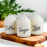 Modern ceramic canister set for kitchen storage labeled tea, coffee, sugar