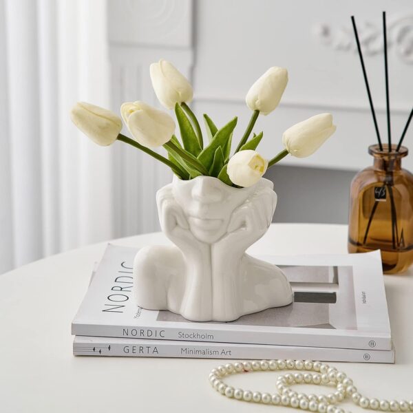 Artistic white face vase made of ceramic for home decor inspiration