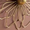 Artistic gold metal wall hanging designed for modern interiors