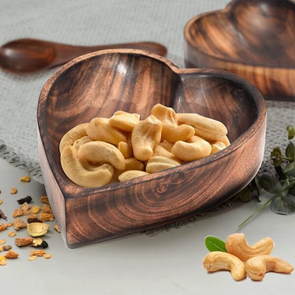 Rustic wooden heart shaped bowl for salads, desserts and dry fruits