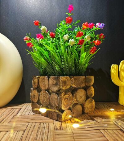 Artificial flowering plant in wood texture pot for home decor