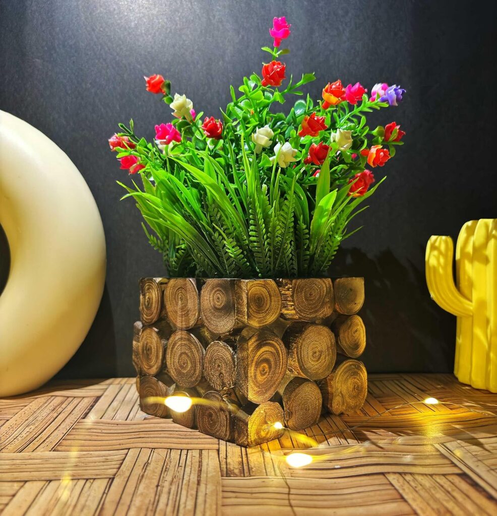 Artificial flowering plant in wood texture pot for home decor