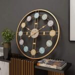 Luxury gold wall clock with antique design and artistic detailing