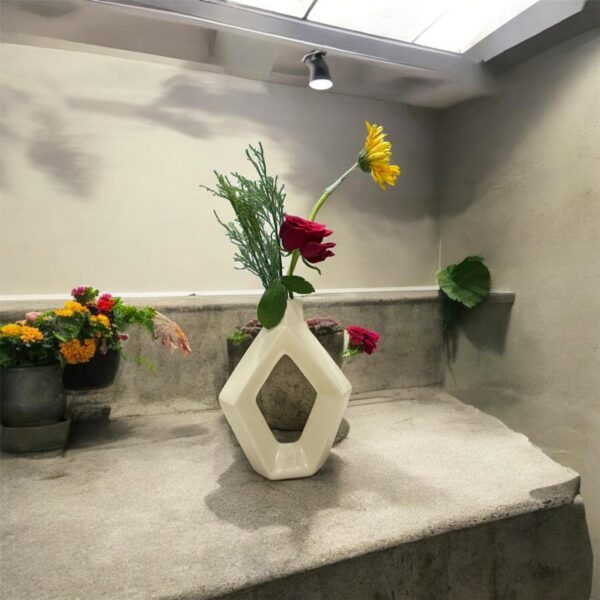 Geometric inspired ceramic vase for aesthetic home decoration