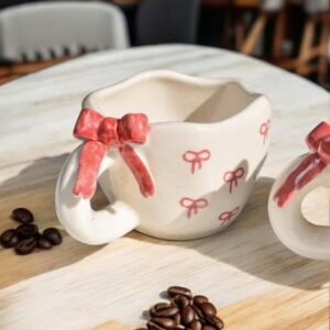 Cute handmade ceramic mug with realistic 3D bow, Pinterest-style hand-painted finish