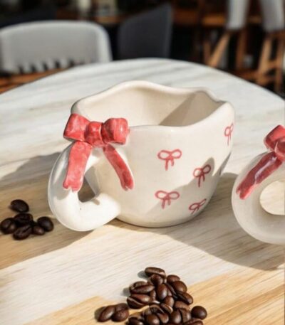 Cute handmade ceramic mug with realistic 3D bow, Pinterest-style hand-painted finish