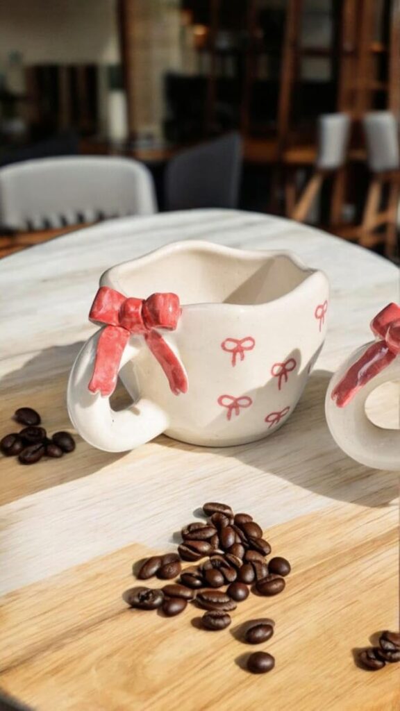 Cute handmade ceramic mug with realistic 3D bow, Pinterest-style hand-painted finish