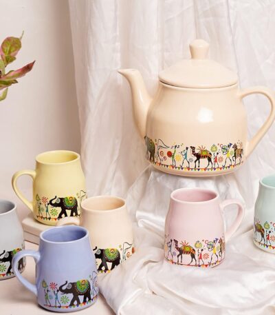 Handcrafted designer ceramic candy tea cup with matching kettle