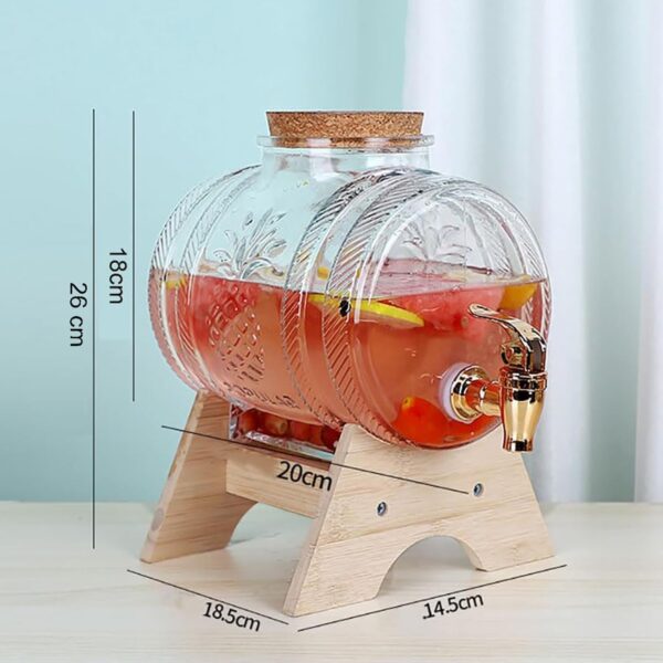 Large glass dispenser with tap for serving juice or water at parties