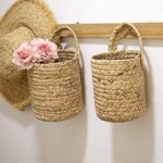 Handcrafted jute cylindrical basket with decorative woven patterns for plants