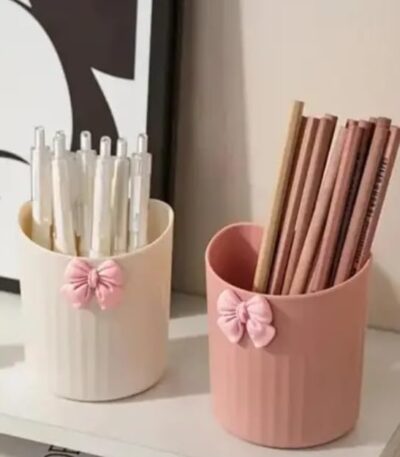 Decorative pen holder set with elegant bow design for office desk