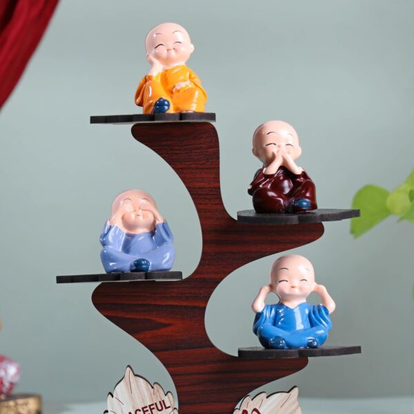 Mini Buddha monk idols with handcrafted detailing and wooden base