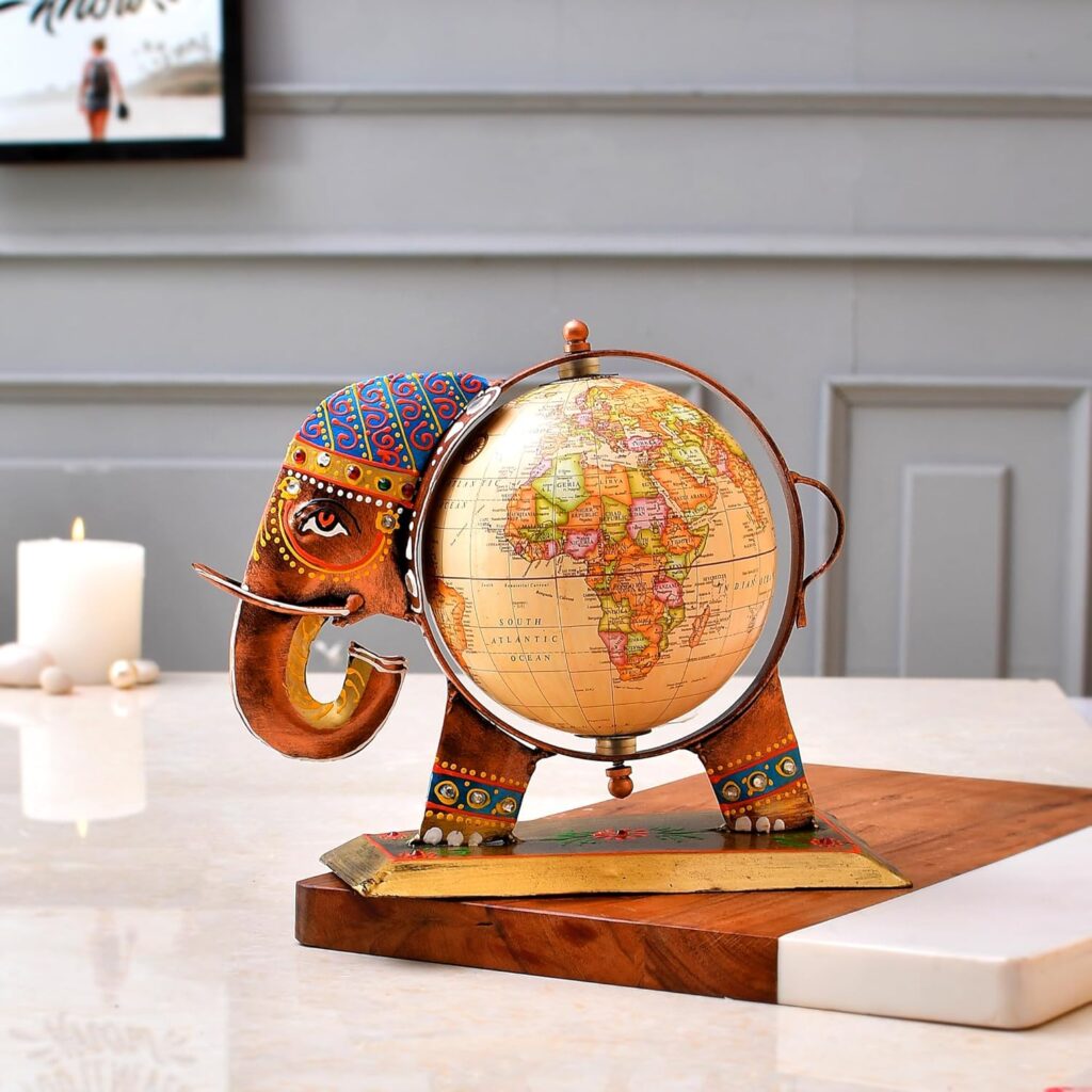 Metal elephant tabletop showpiece with decorative world globe