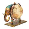 Globe showpiece featuring metal elephant holding miniature globe
