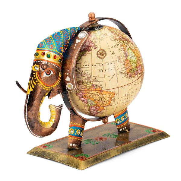 Globe showpiece featuring metal elephant holding miniature globe