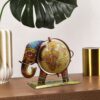 Stylish elephant holding globe sculpture for modern home décor