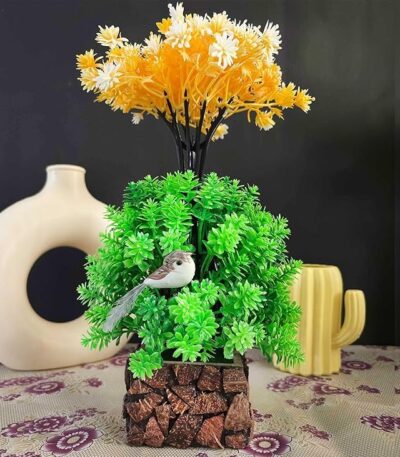 Small fake plants with multicolor artificial flowers in coconut wooden pot