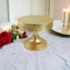 Beautiful gold metallic dessert stand for luxury events