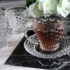 Elegant transparent glass tea cup and saucer for hot beverages