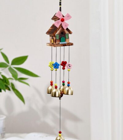 Beautiful metal wind chimes hanging in balcony bringing peace and positive energy