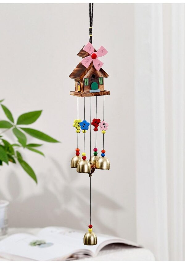 Beautiful metal wind chimes hanging in balcony bringing peace and positive energy