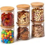 Clear glass jar with airtight wooden lid for kitchen food storage